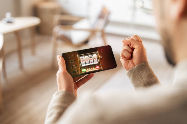 macan33 login mobile app interface showing live football markets and live casino sections